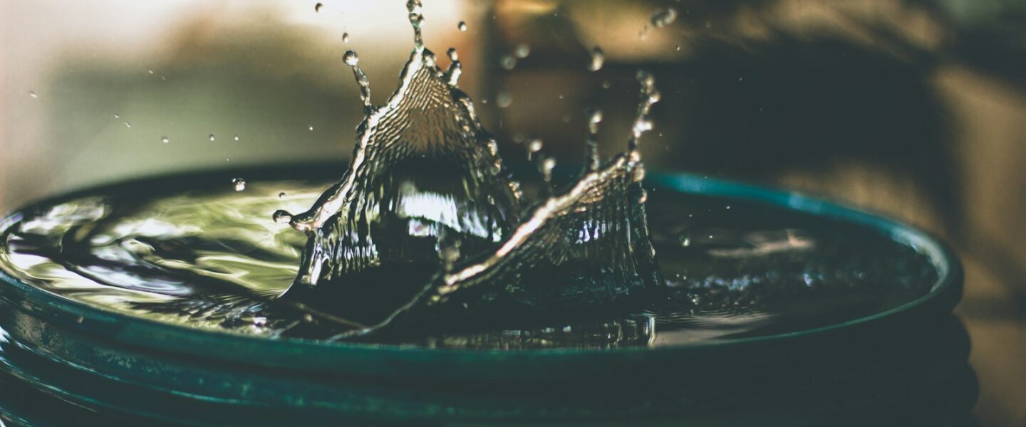 water drop on bucket photo